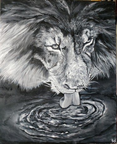 Le lion au bord de l'eau